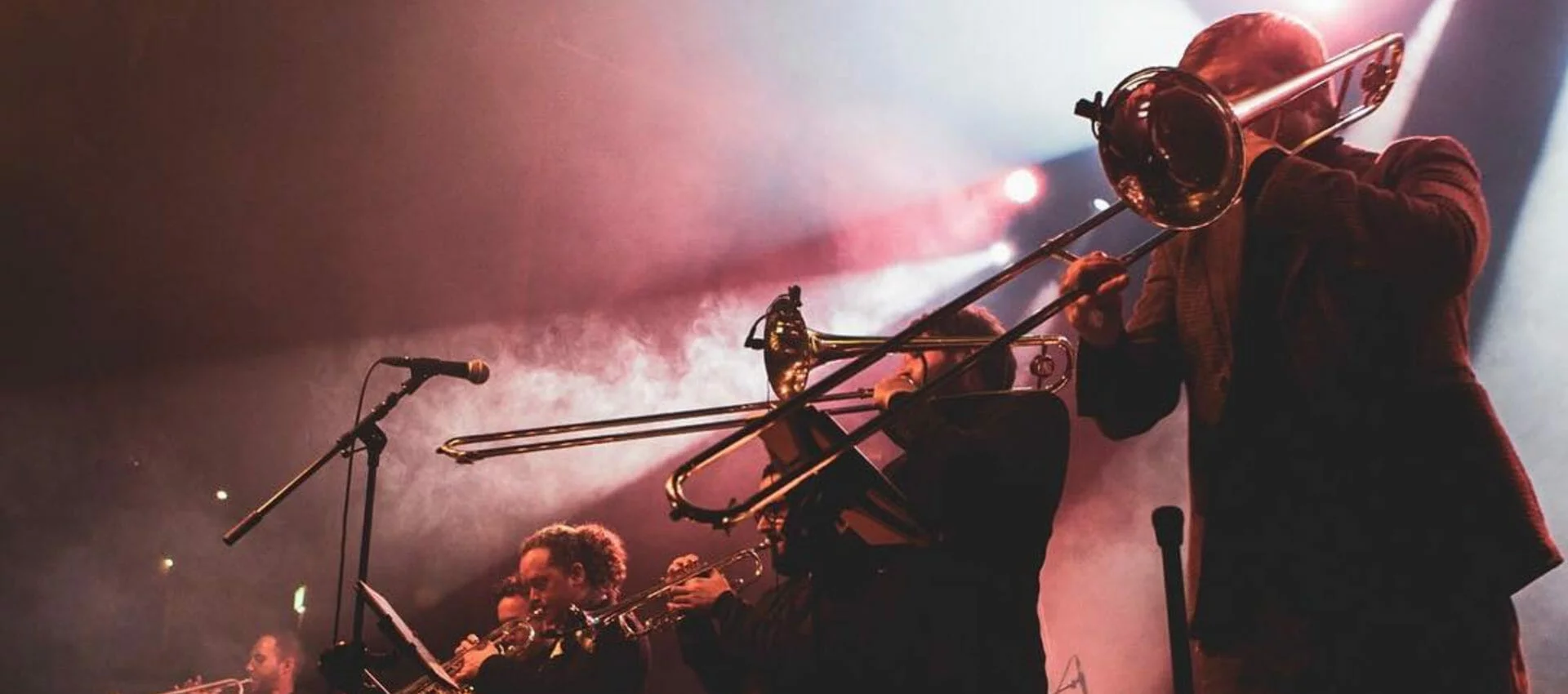 A Brass Rave. With Neon Dancers.