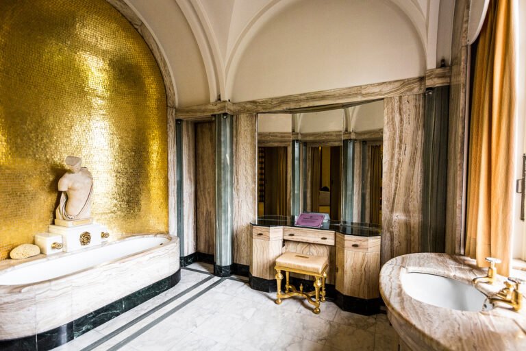 Eltham Palace - bathroom with gold statement wall